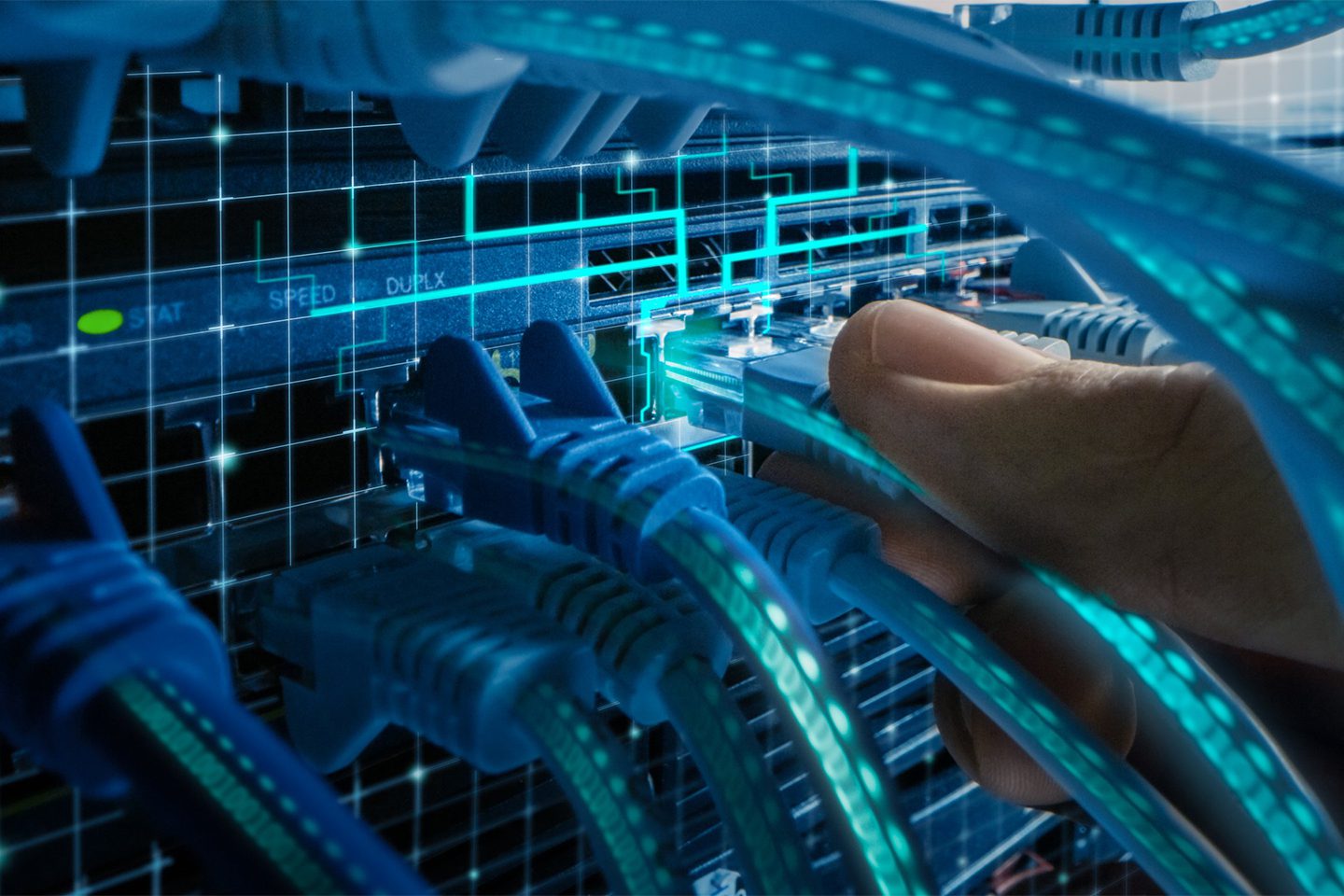 Hand plugging an Ethernet cable into a server rack with glowing network lines.