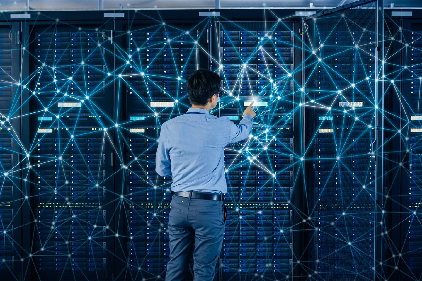 Man interacting with a digital network interface of connected nodes.